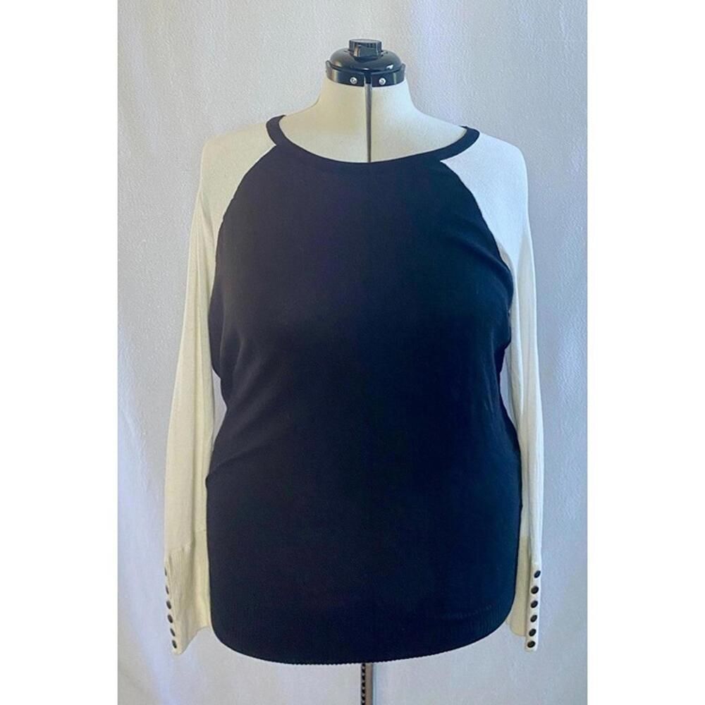 Wearing Your Heart on Your Sleeve long sleeve top with button details. Large
